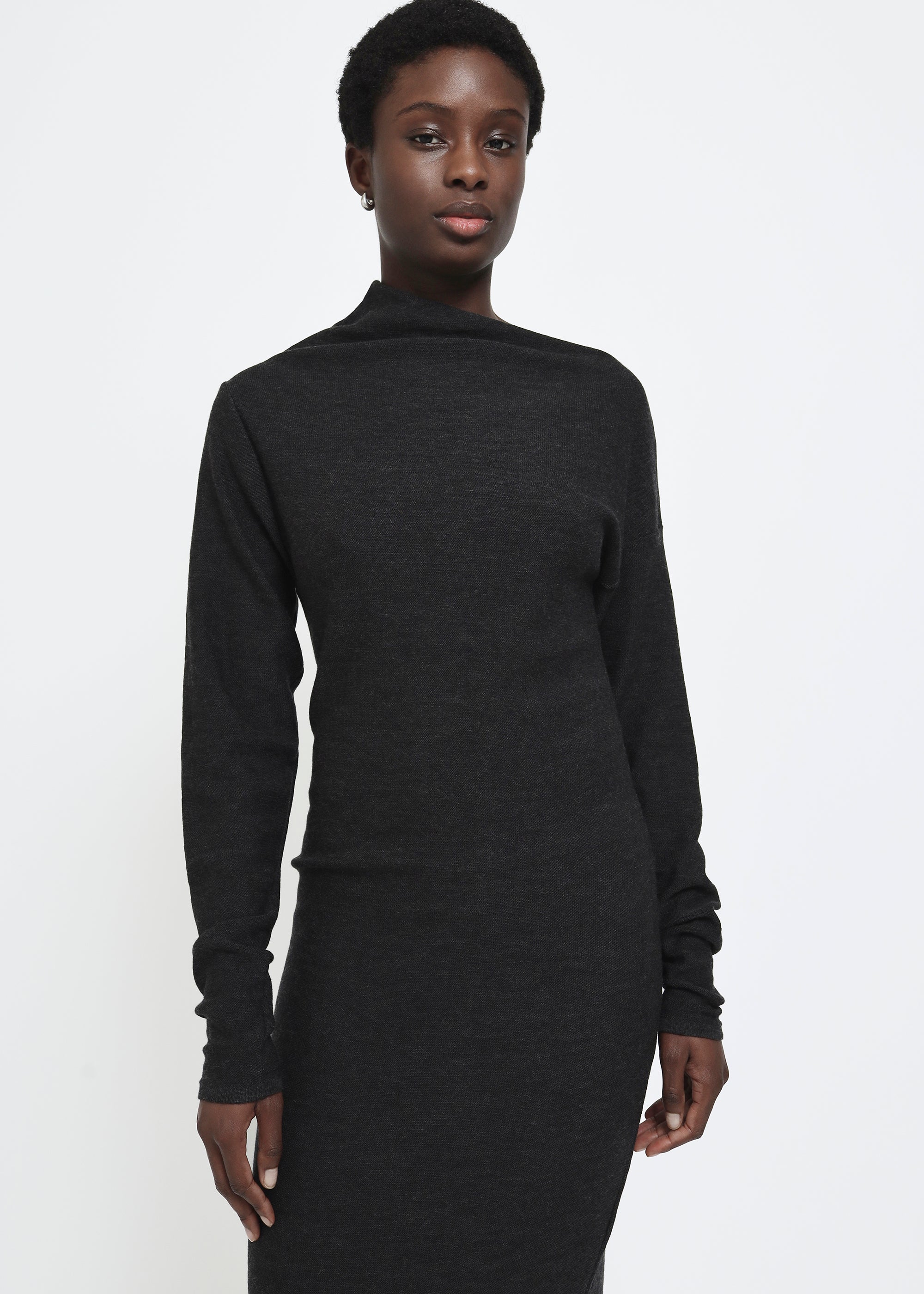 A dark gray knitted long-sleeve asymmetric mock neck midi dress.
