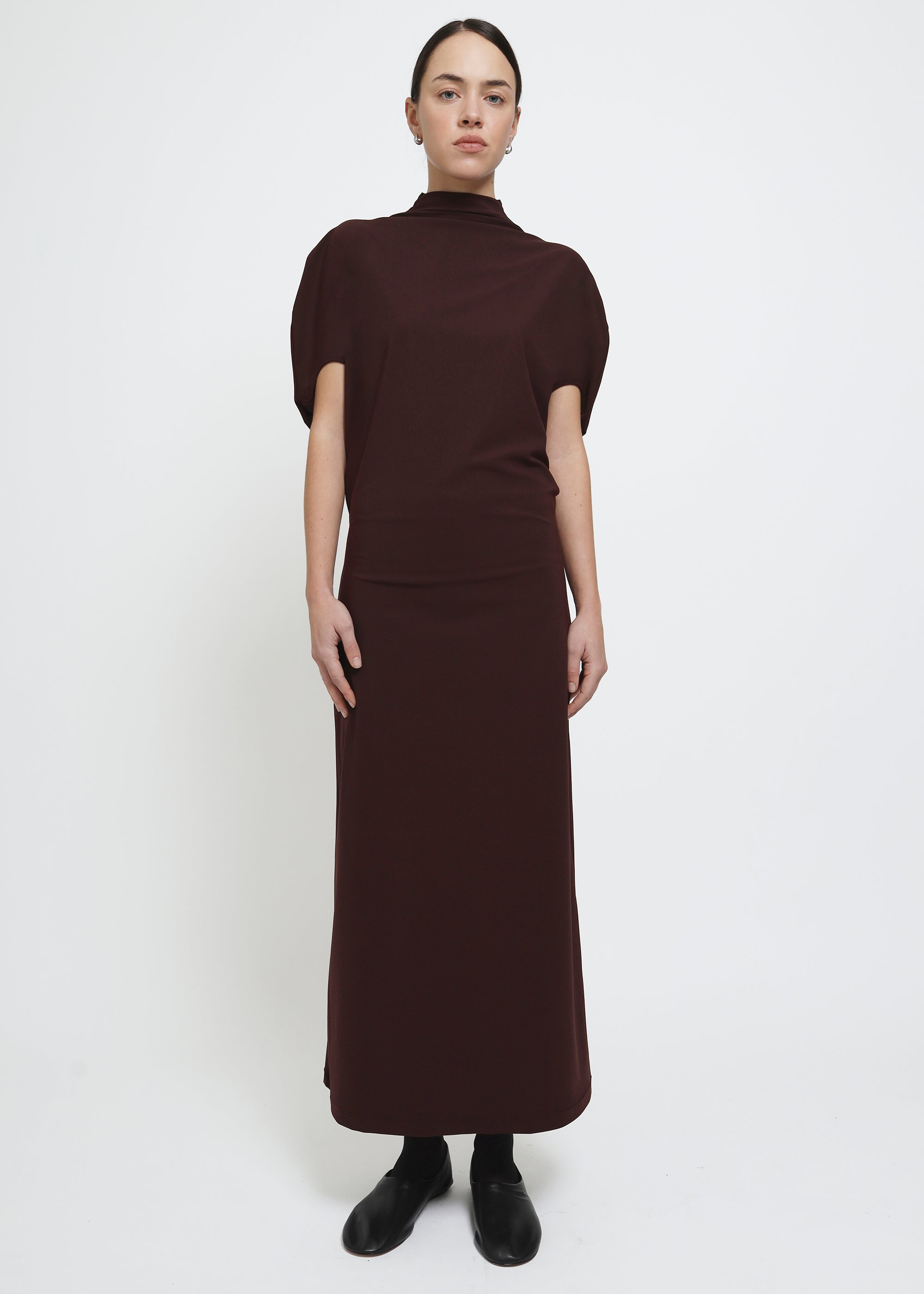 A dark brown red mock-neck dress with short puff sleeves.