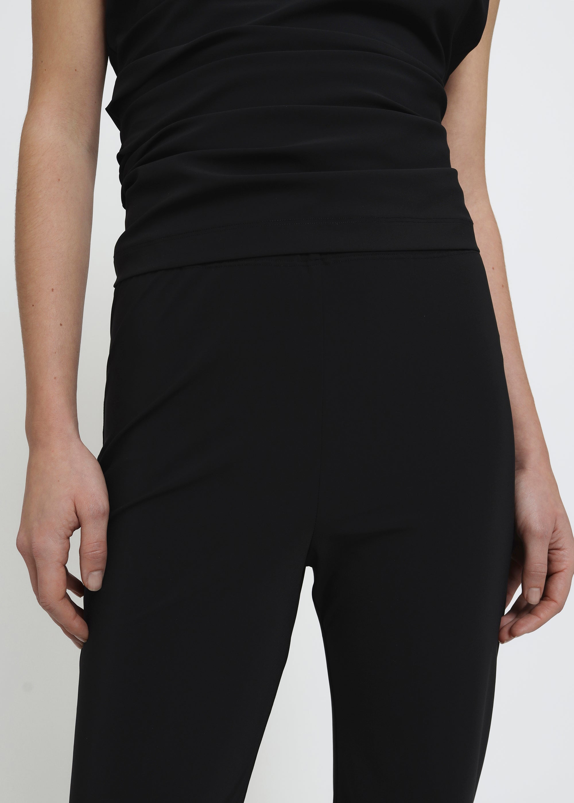 Black straight-leg pull on polyamide pants.
