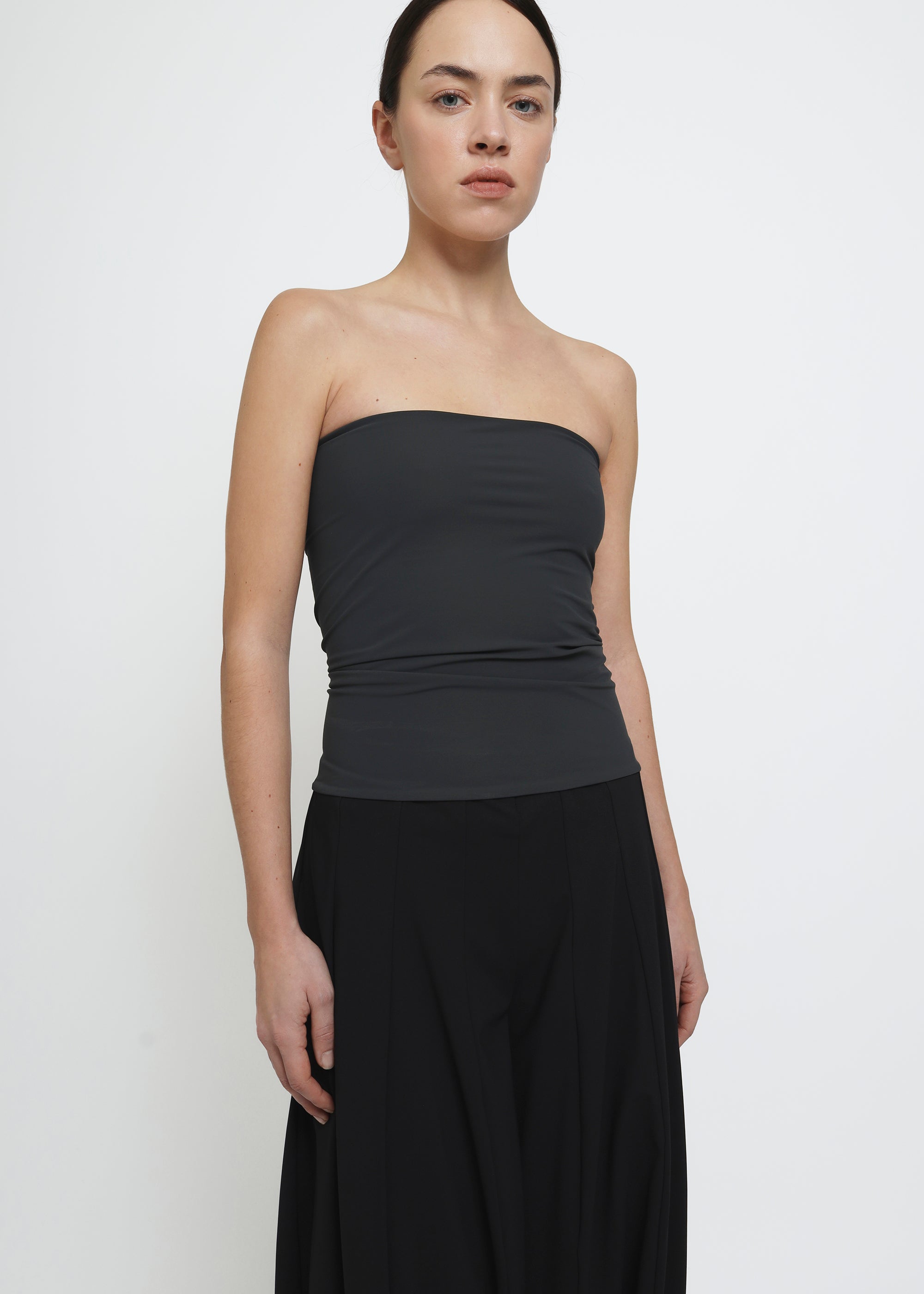A dark gray strapless tube top.