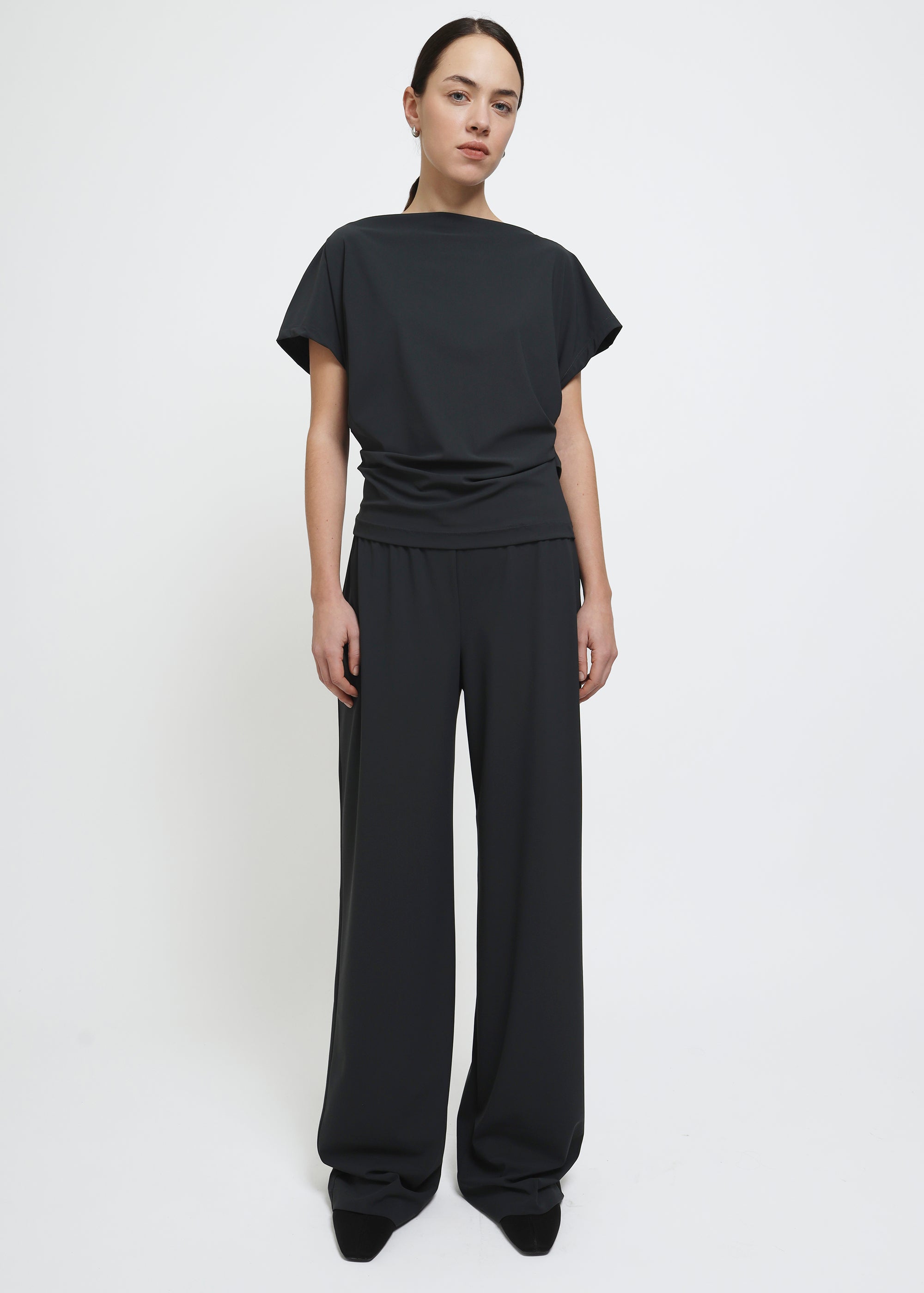 Dark grey wide legged pull on pants.