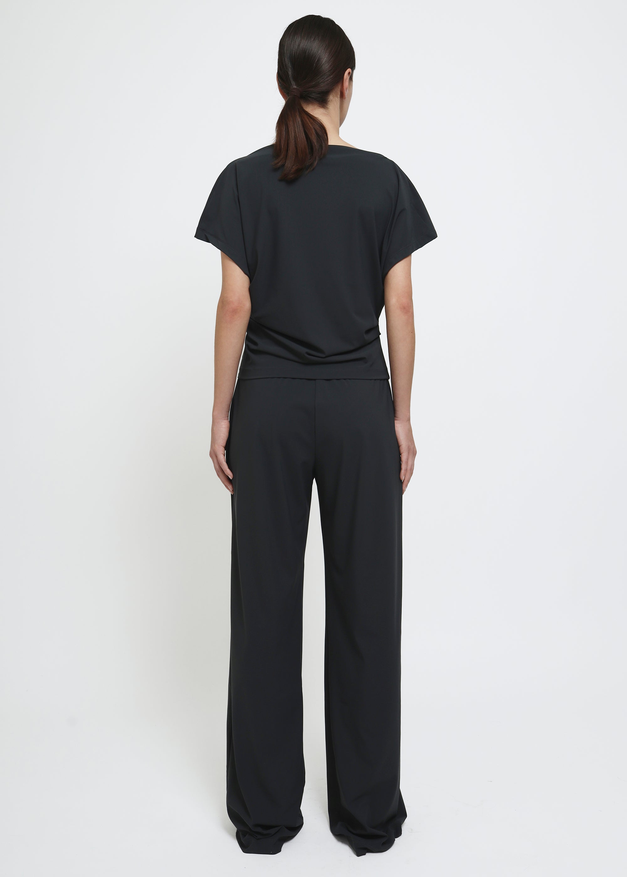 Dark grey wide legged pull on pants.