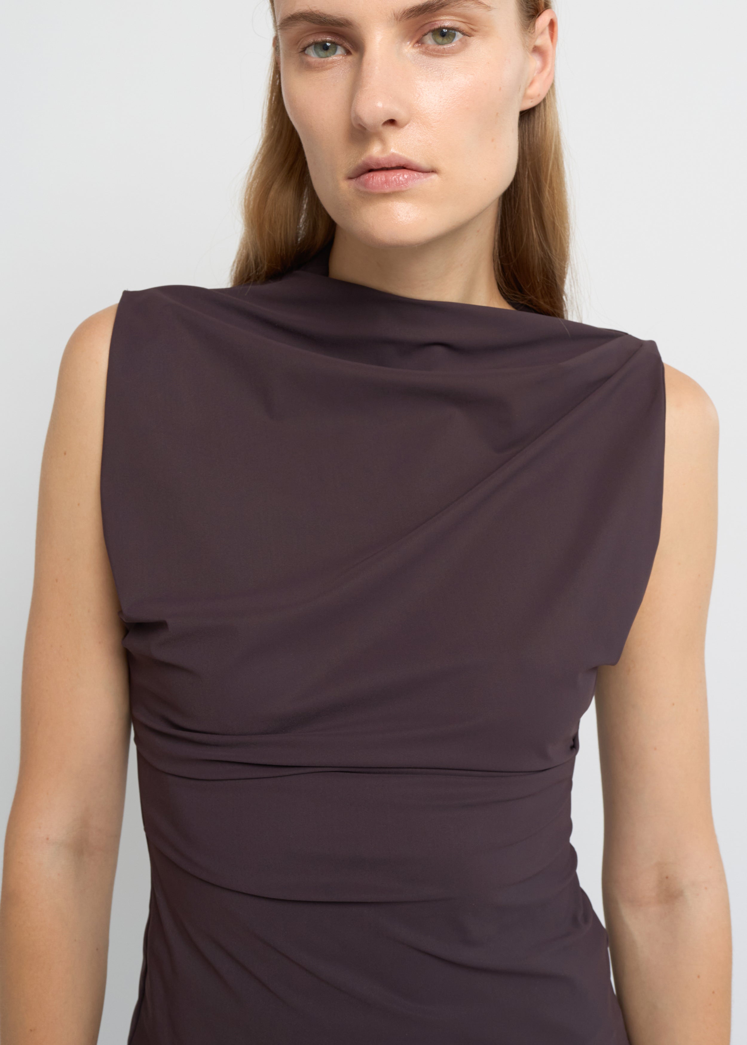 Fig sleeveless top with an asymmetrical neckline and side waist folds