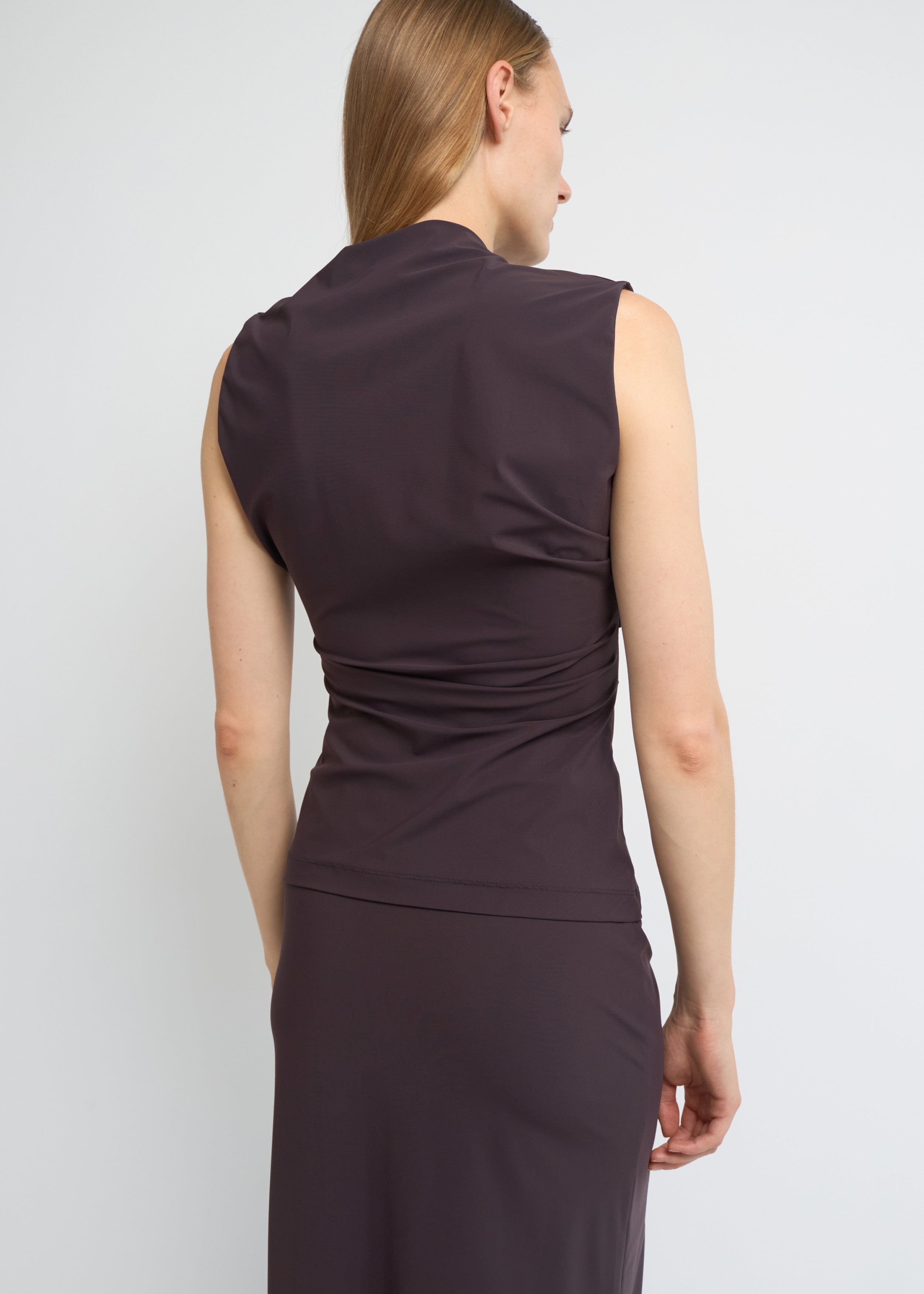 Fig sleeveless top with an asymmetrical neckline and side waist folds
