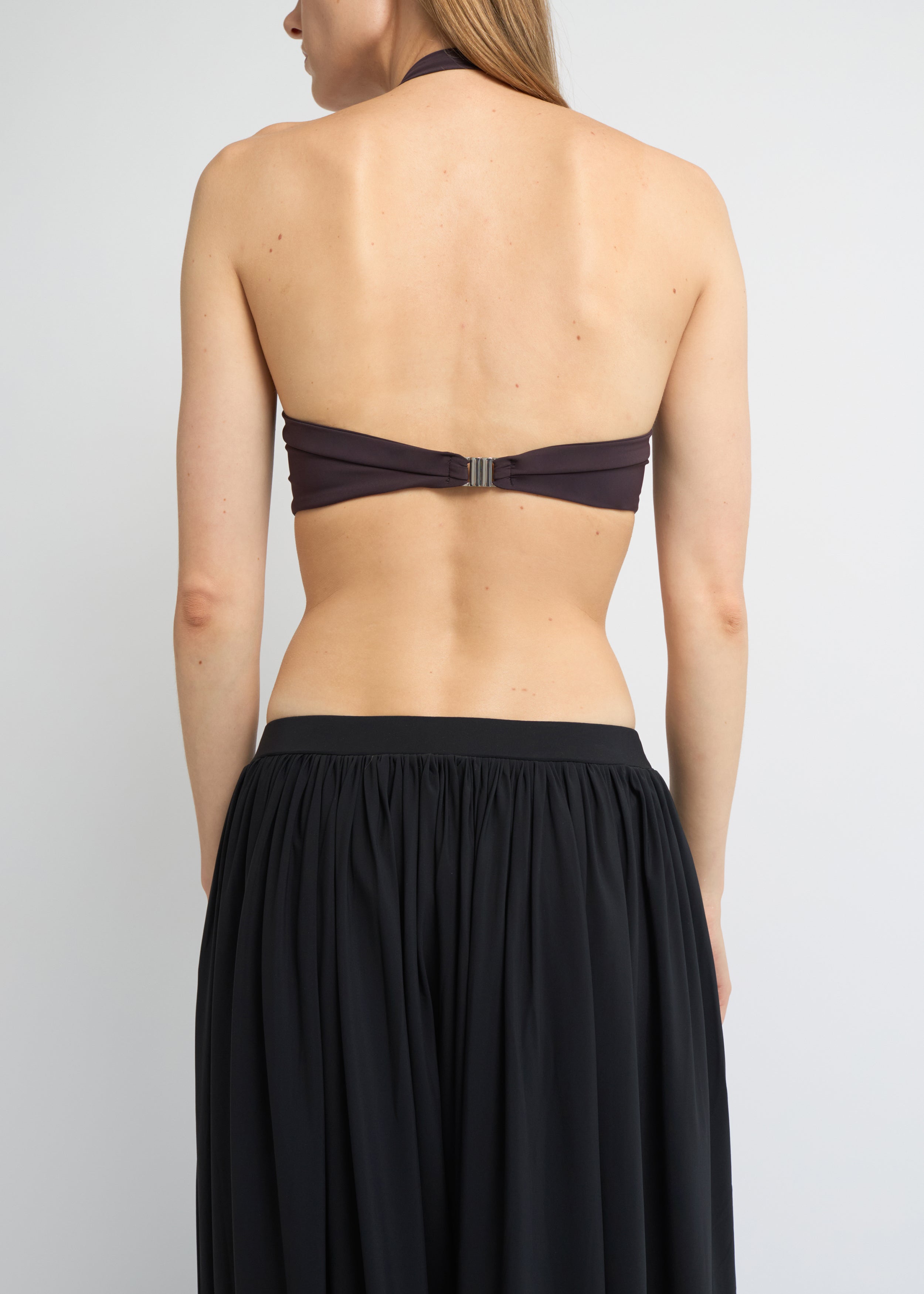 Black balloon pants with voluminous silhouette and gathered hems