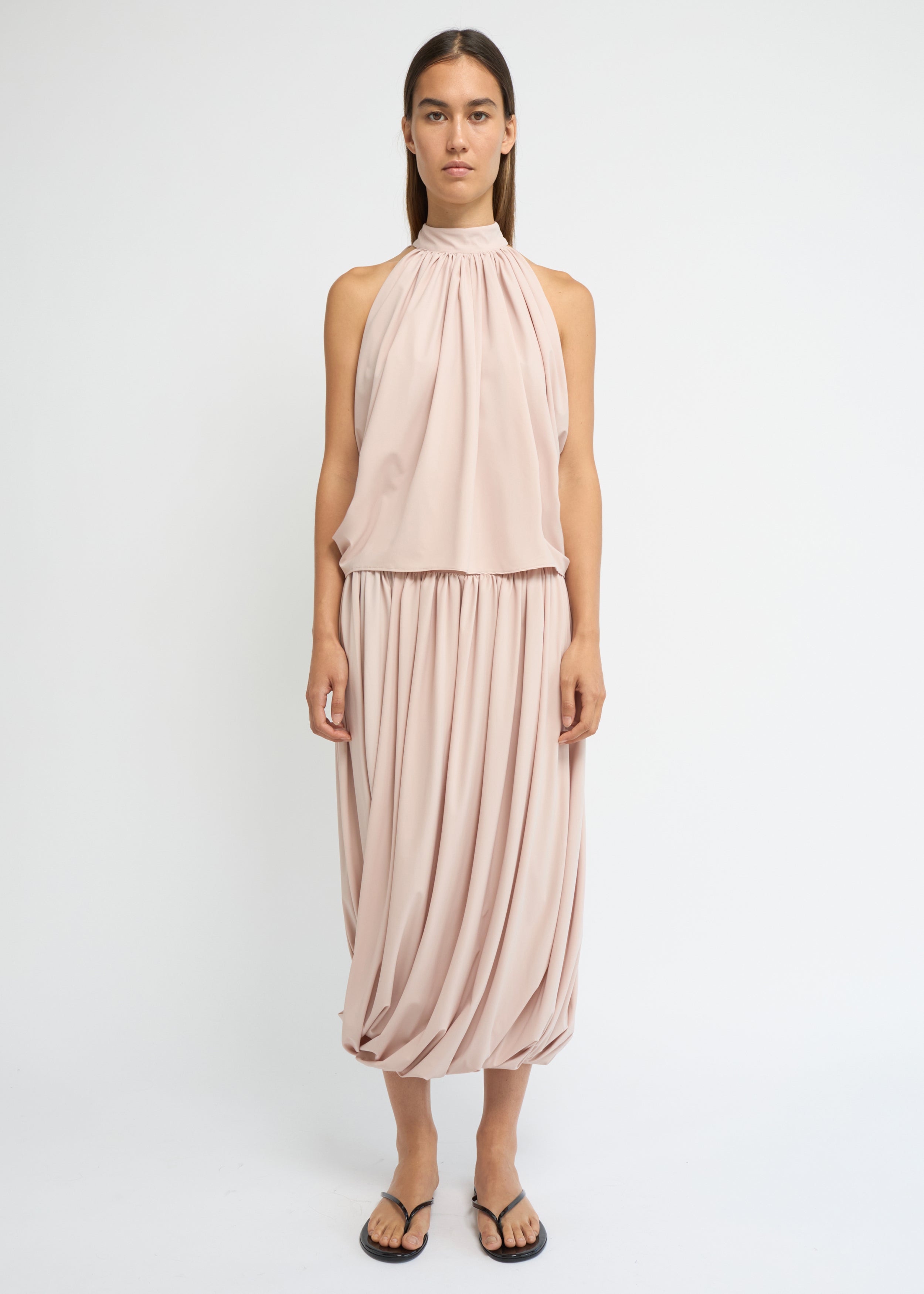 Blush balloon midi skirt with a voluminous, gathered silhouette