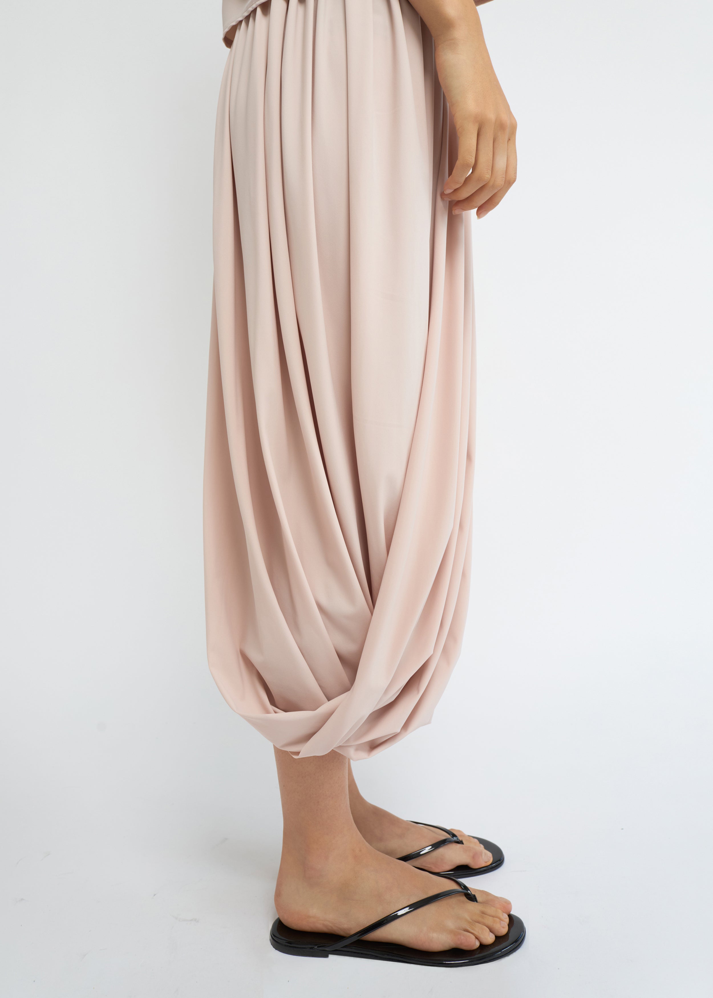 Blush balloon midi skirt with a voluminous, gathered silhouette