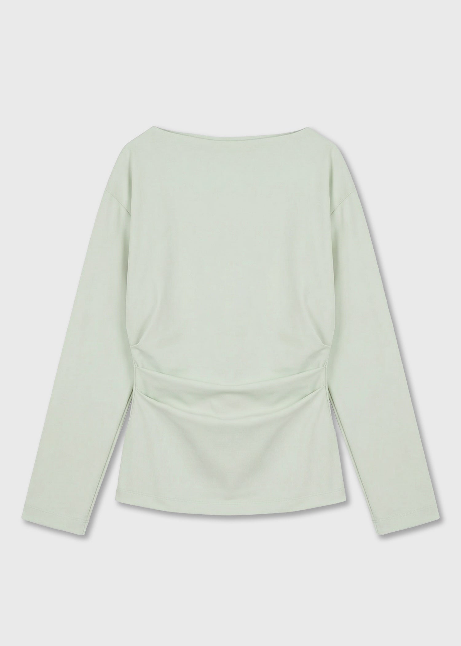 A light sage green long-sleeve top.