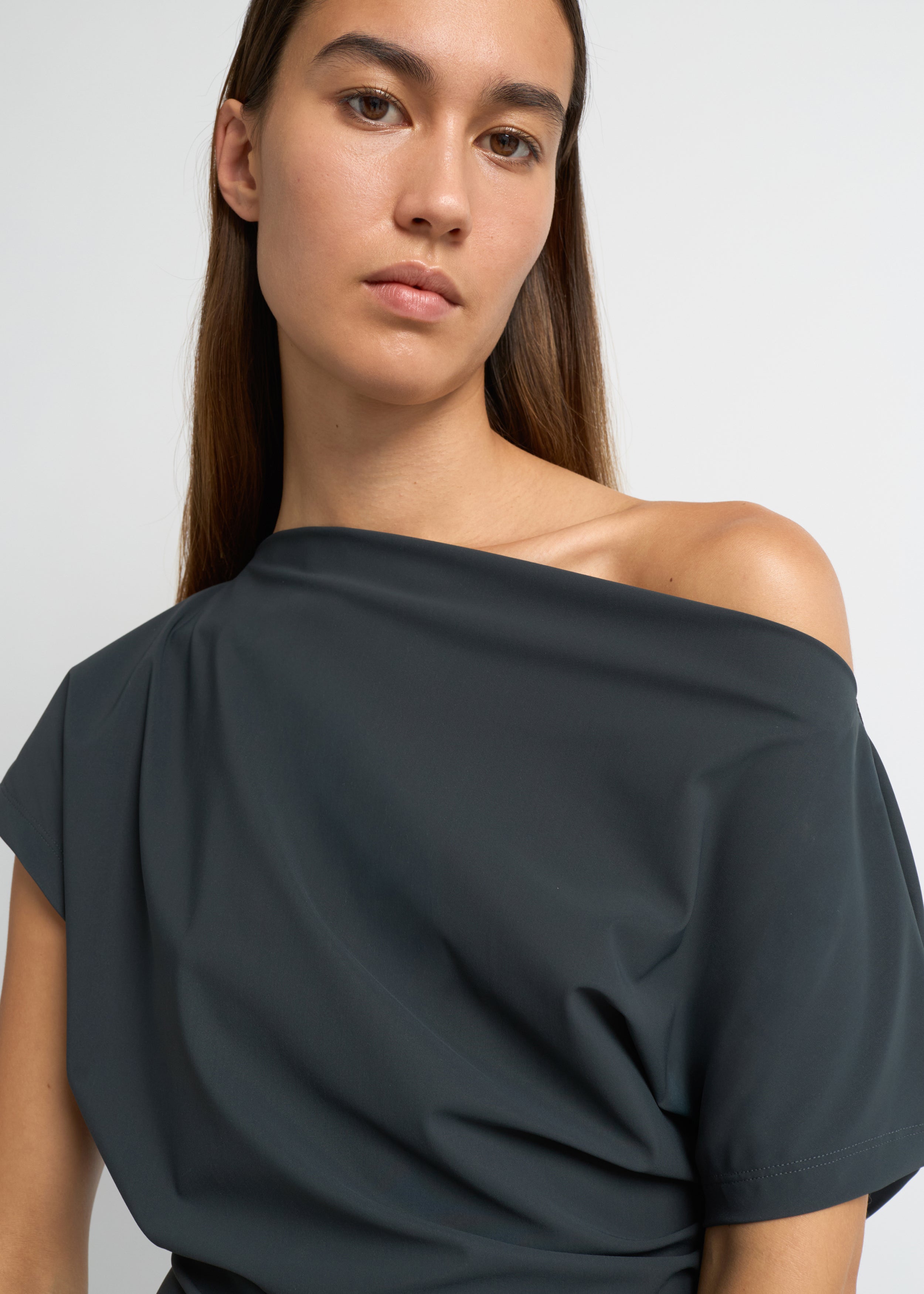 Charcoal off-shoulder draped top with soft waist gathering