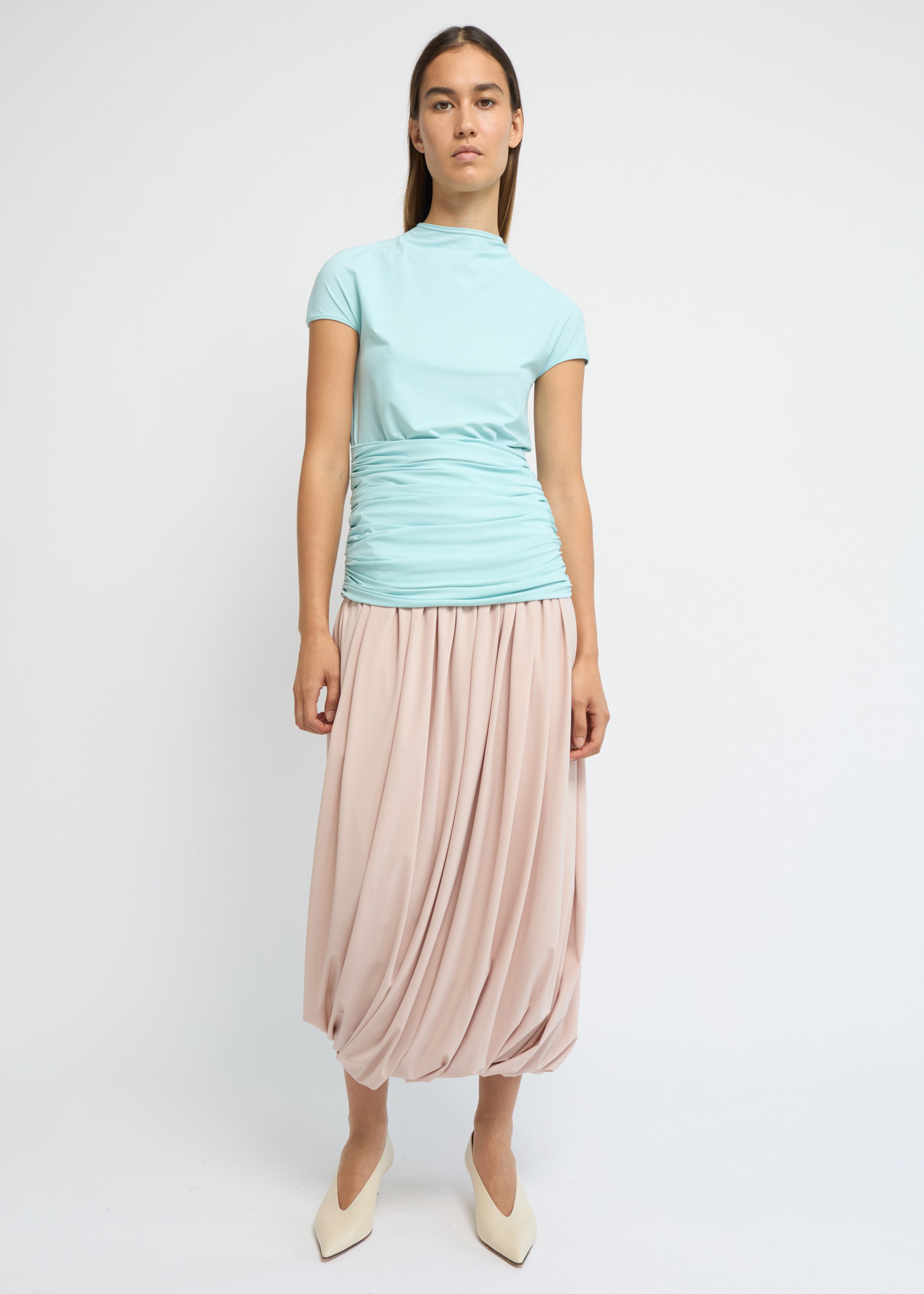 Sky fitted short-sleeve top with a high neckline and soft gathers at the waist