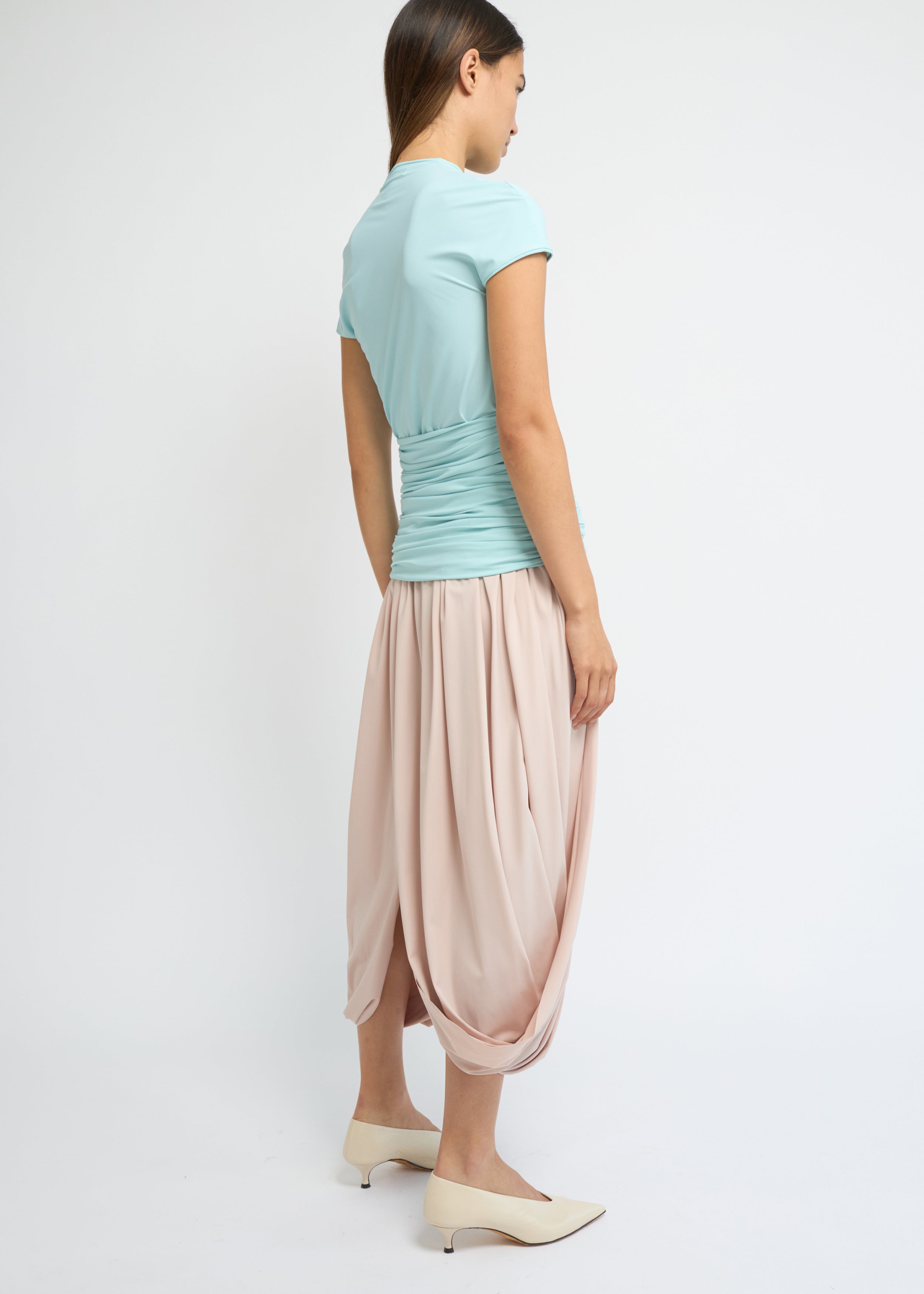 Sky fitted short-sleeve top with a high neckline and soft gathers at the waist
