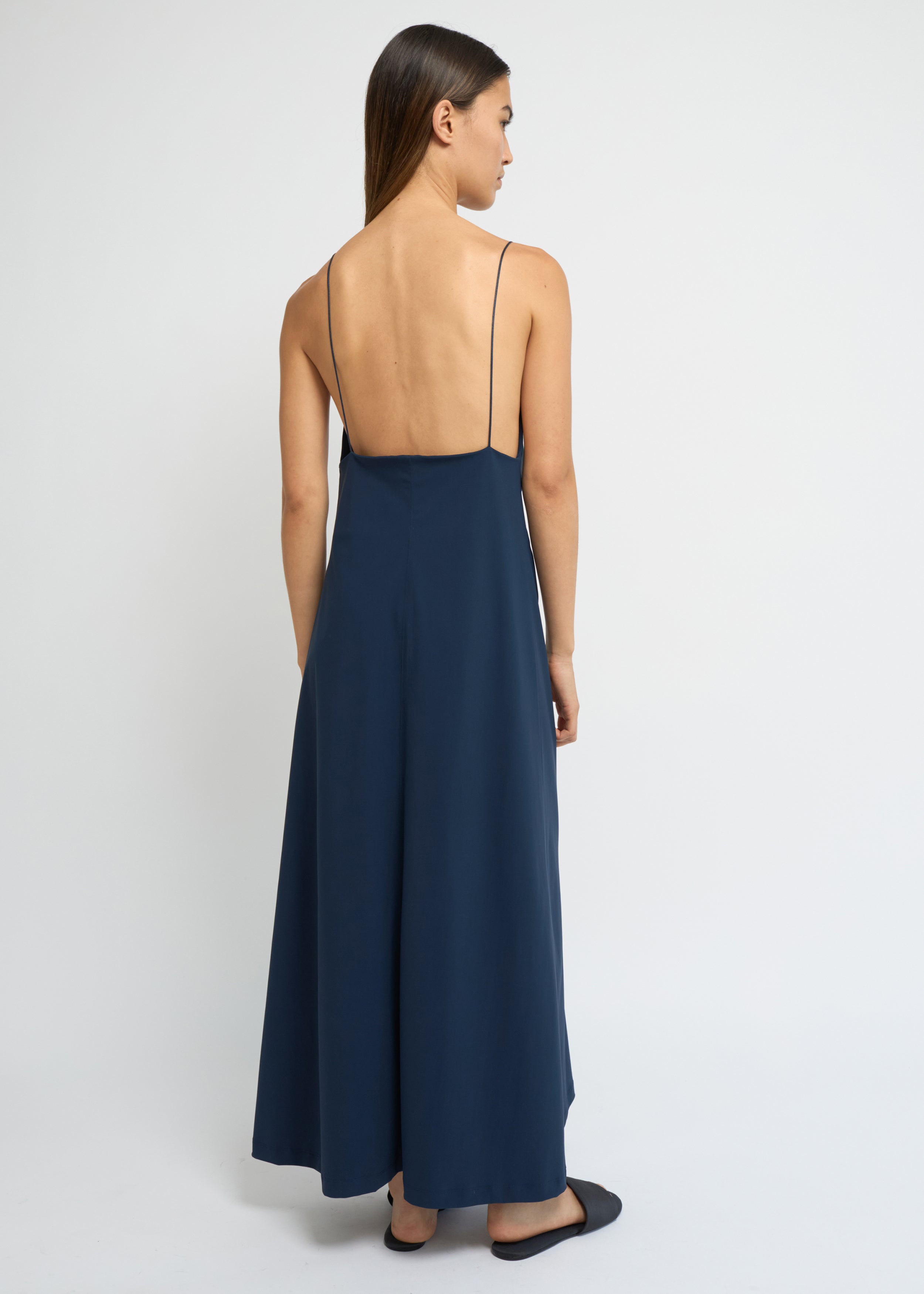 Ink slip dress with a deep V-neckline and fluid, ankle-length silhouette