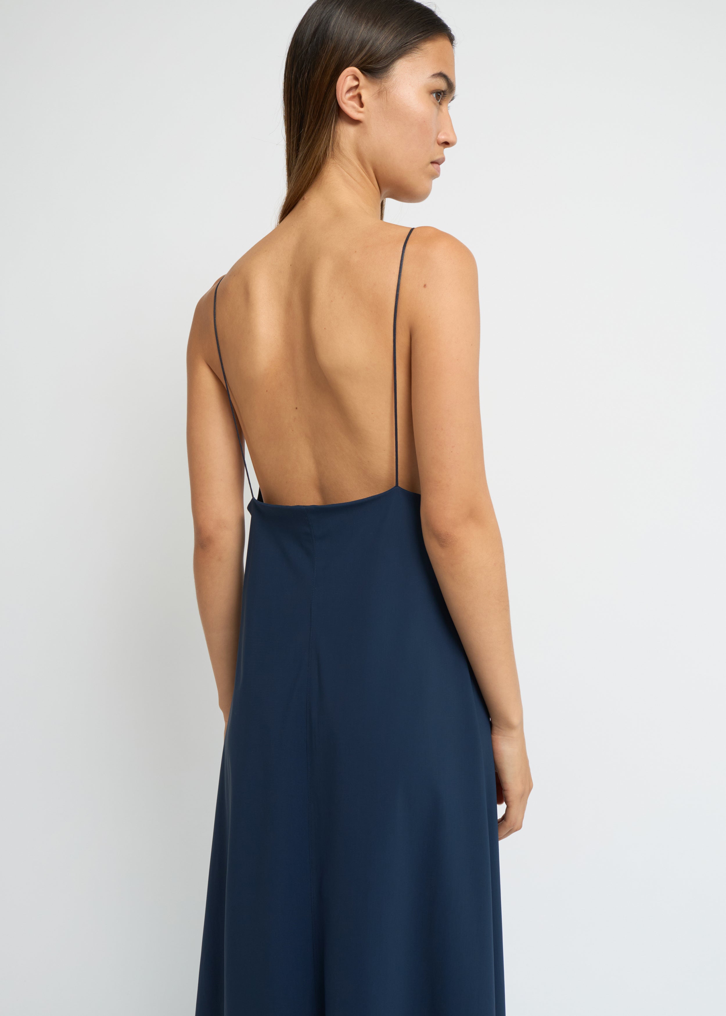 Ink slip dress with a deep V-neckline and fluid, ankle-length silhouette