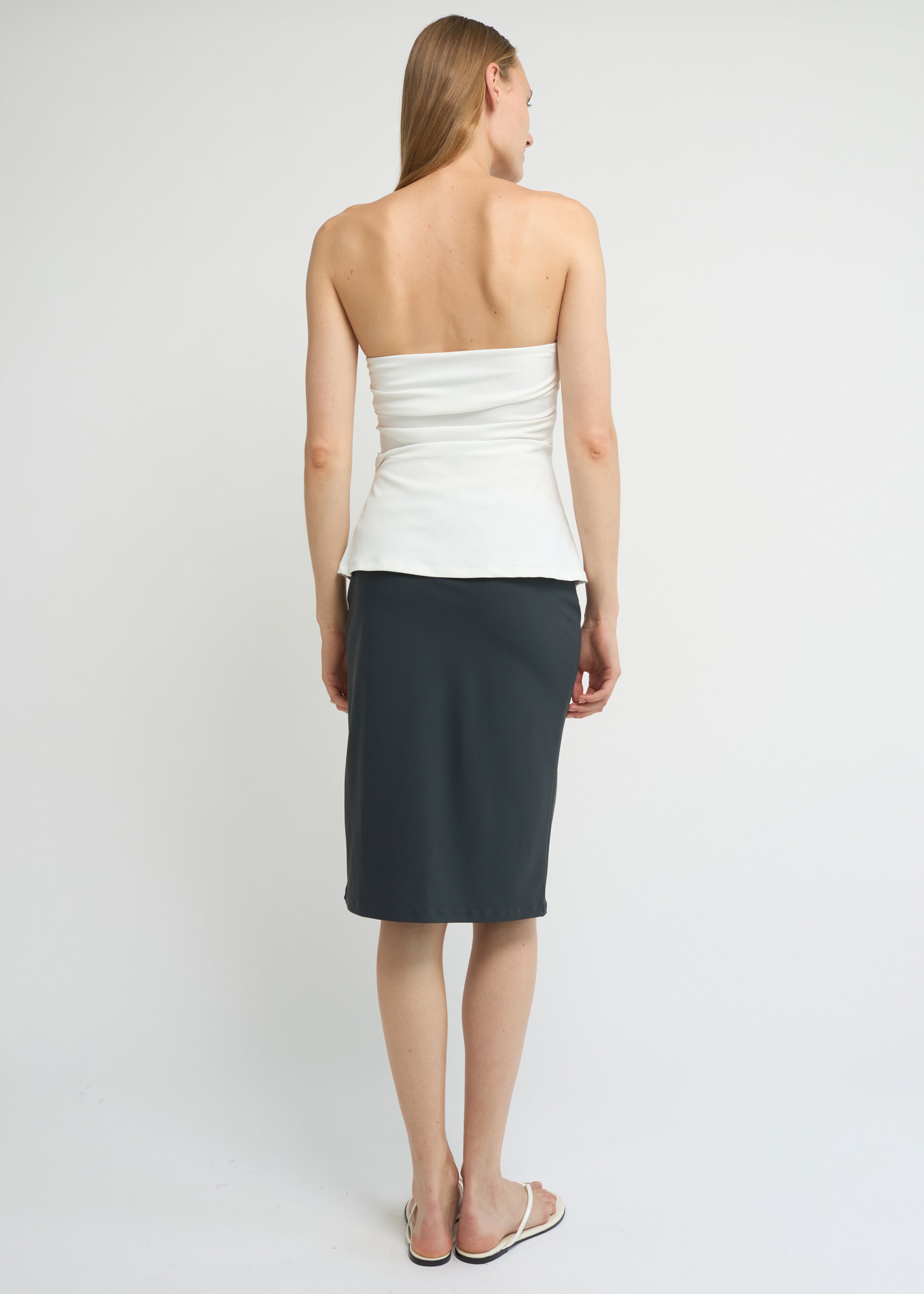 Charcoal straight-fit midi skirt with a clean, minimal silhouette