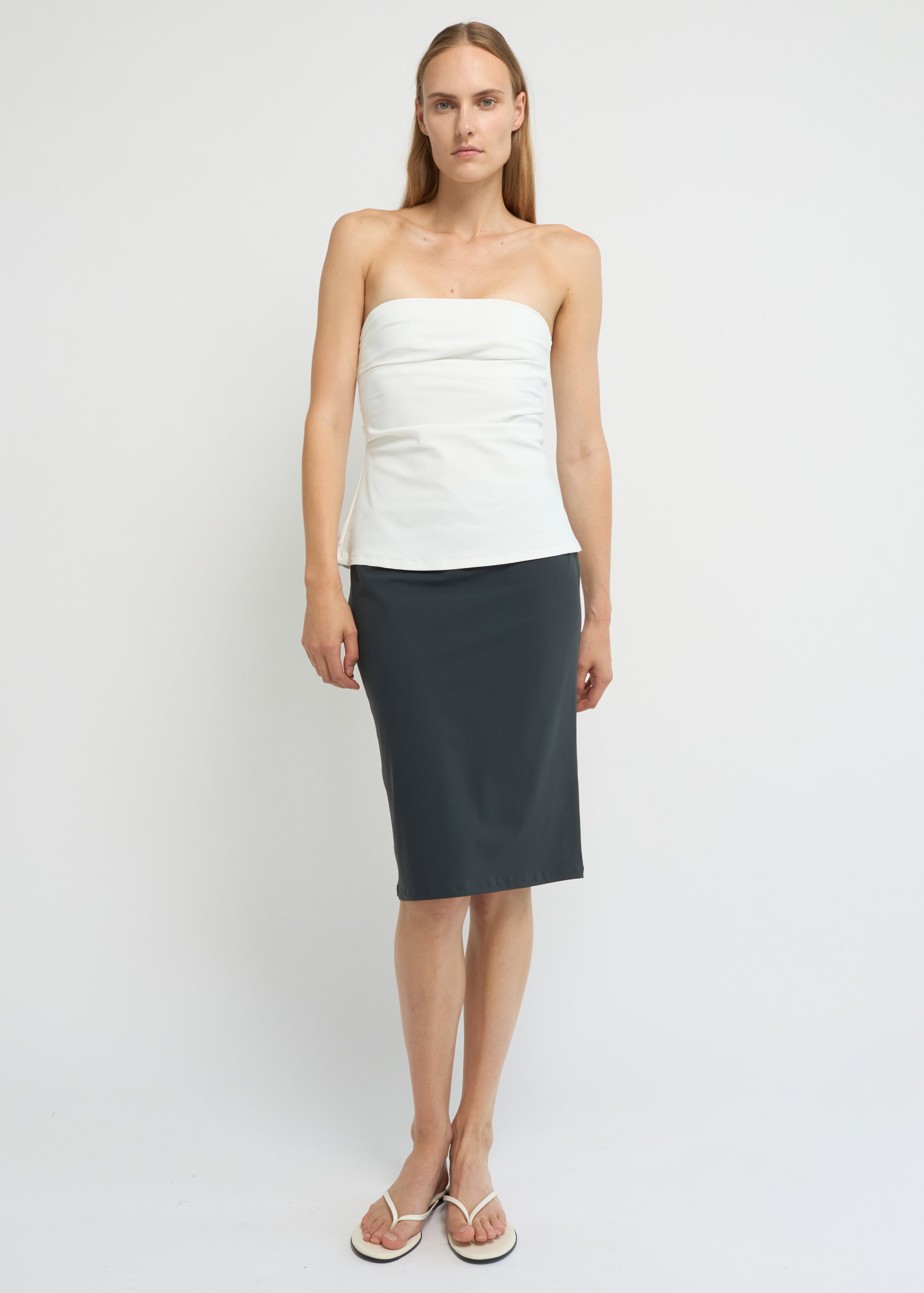 Charcoal straight-fit midi skirt with a clean, minimal silhouette