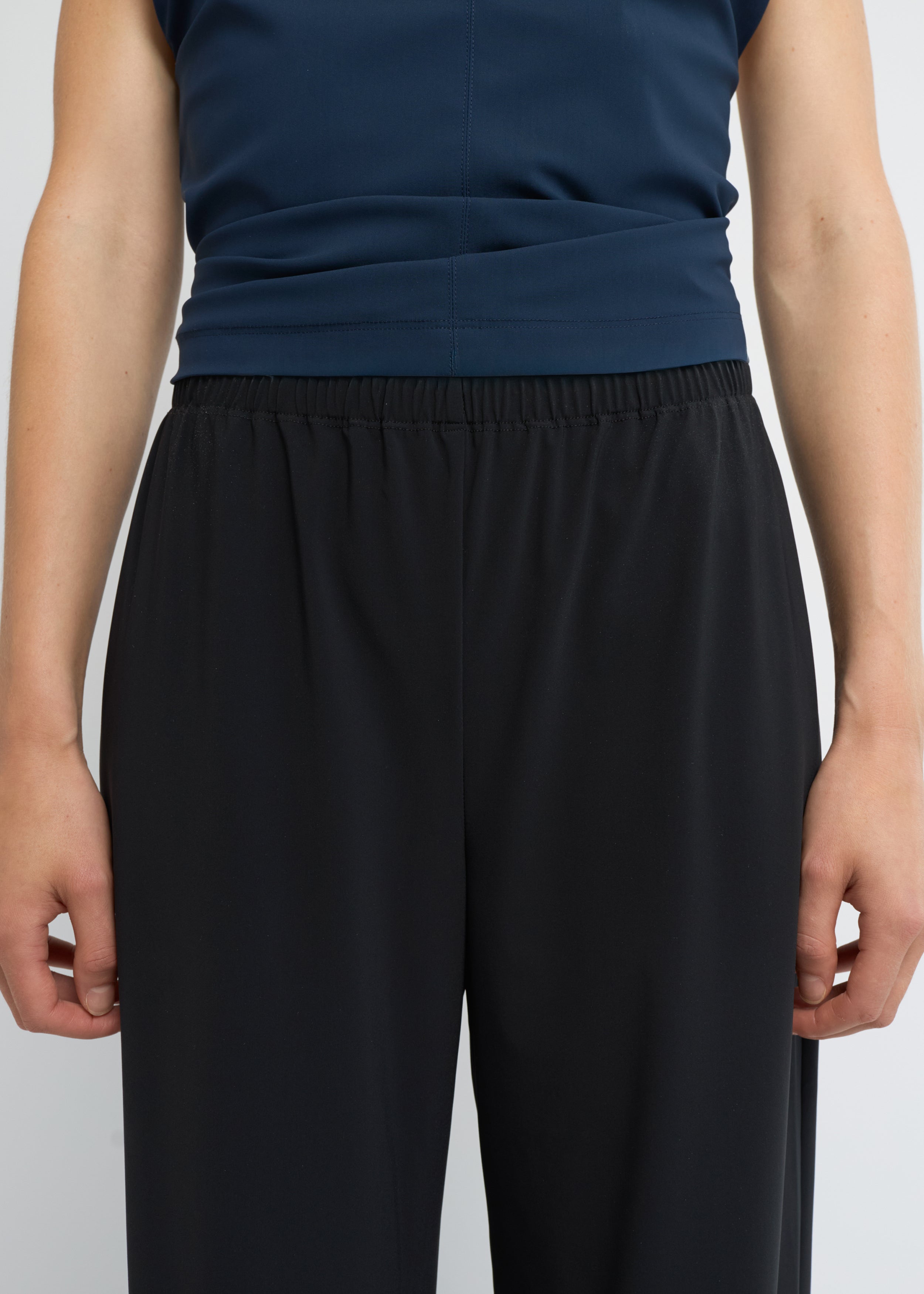 Black wide fit pants with loose, relaxed silhouette