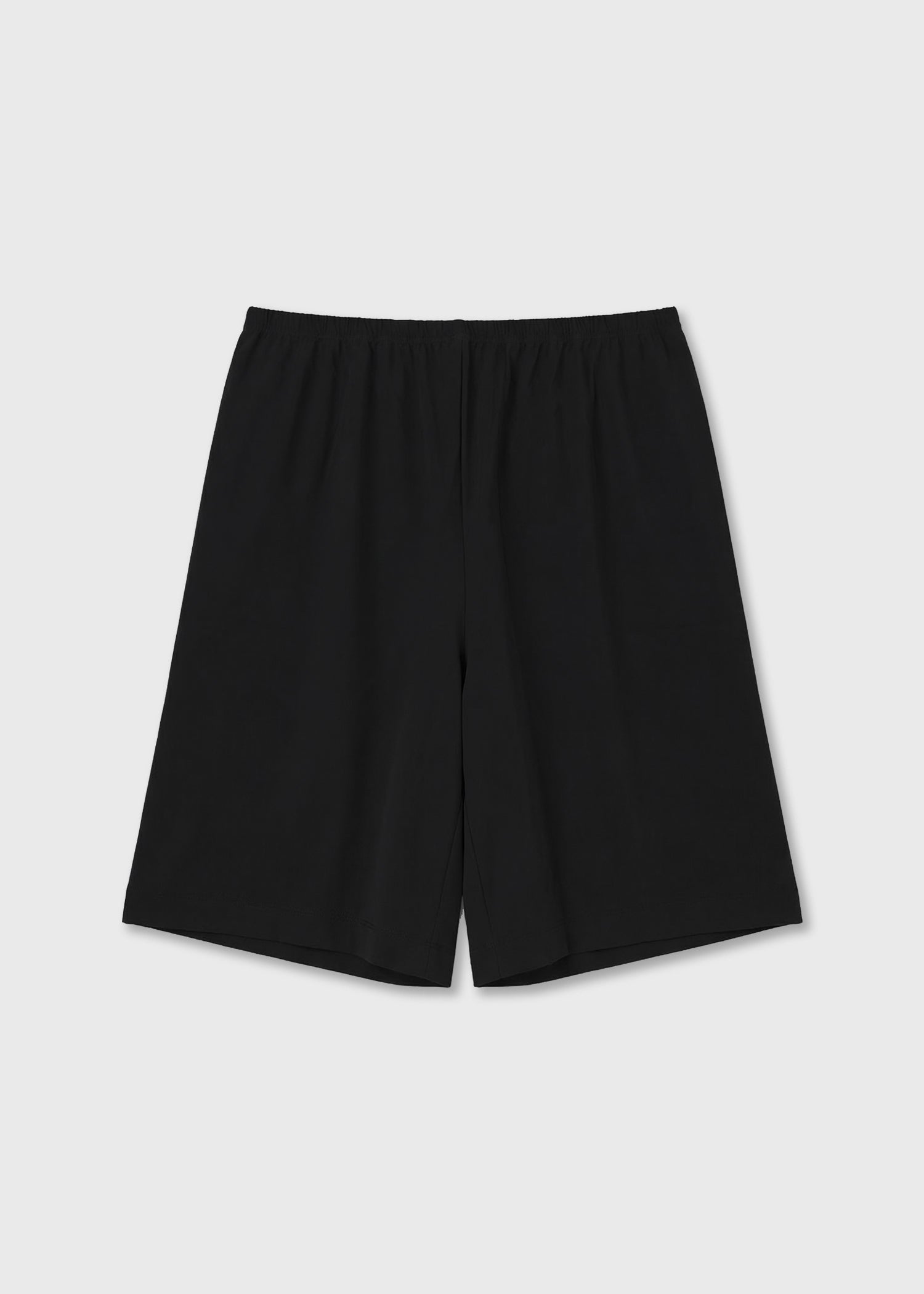 Black wide-fit shorts with a relaxed silhouette and elasticated waistband
