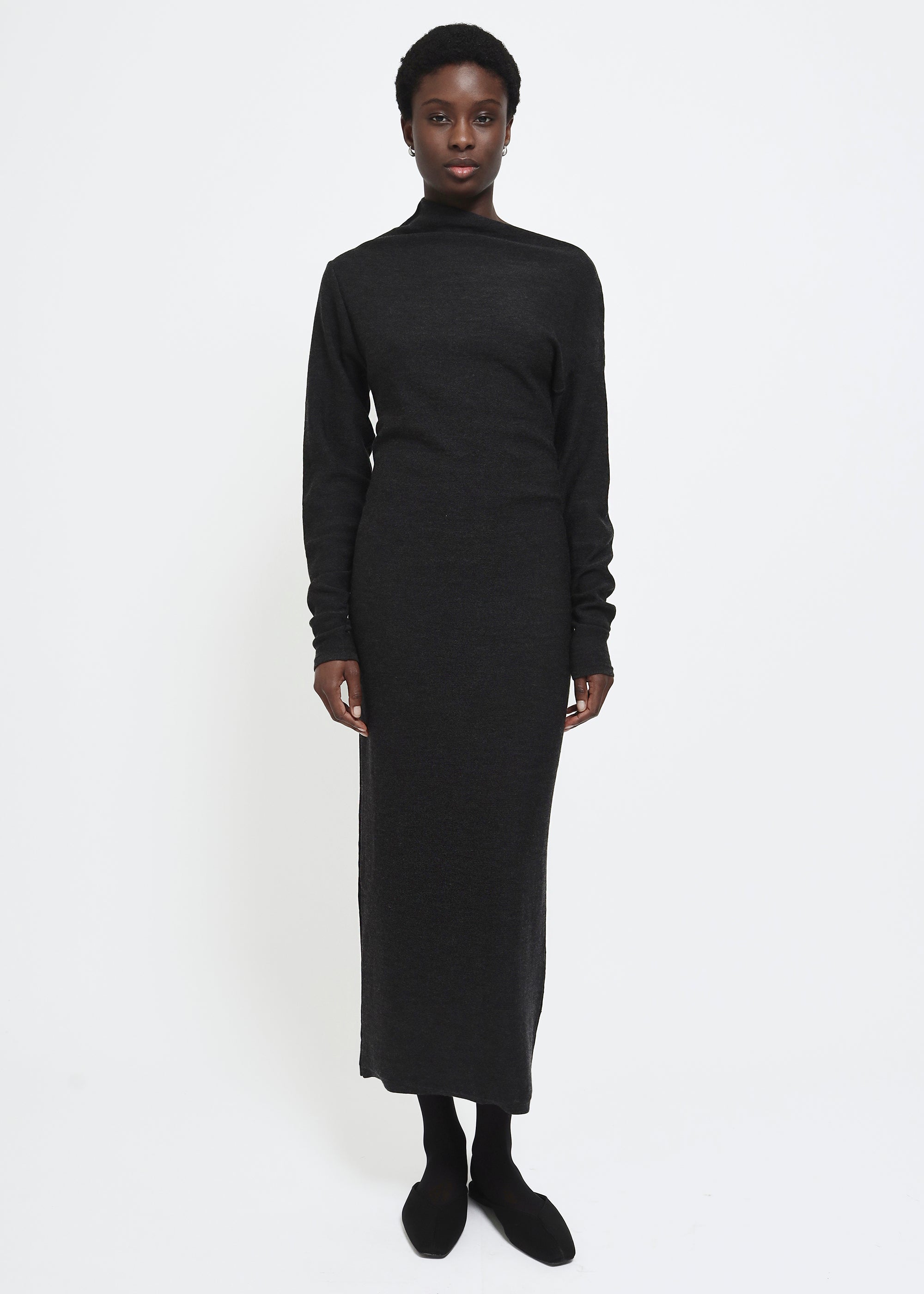 A dark gray knitted long-sleeve asymmetric mock neck midi dress.
