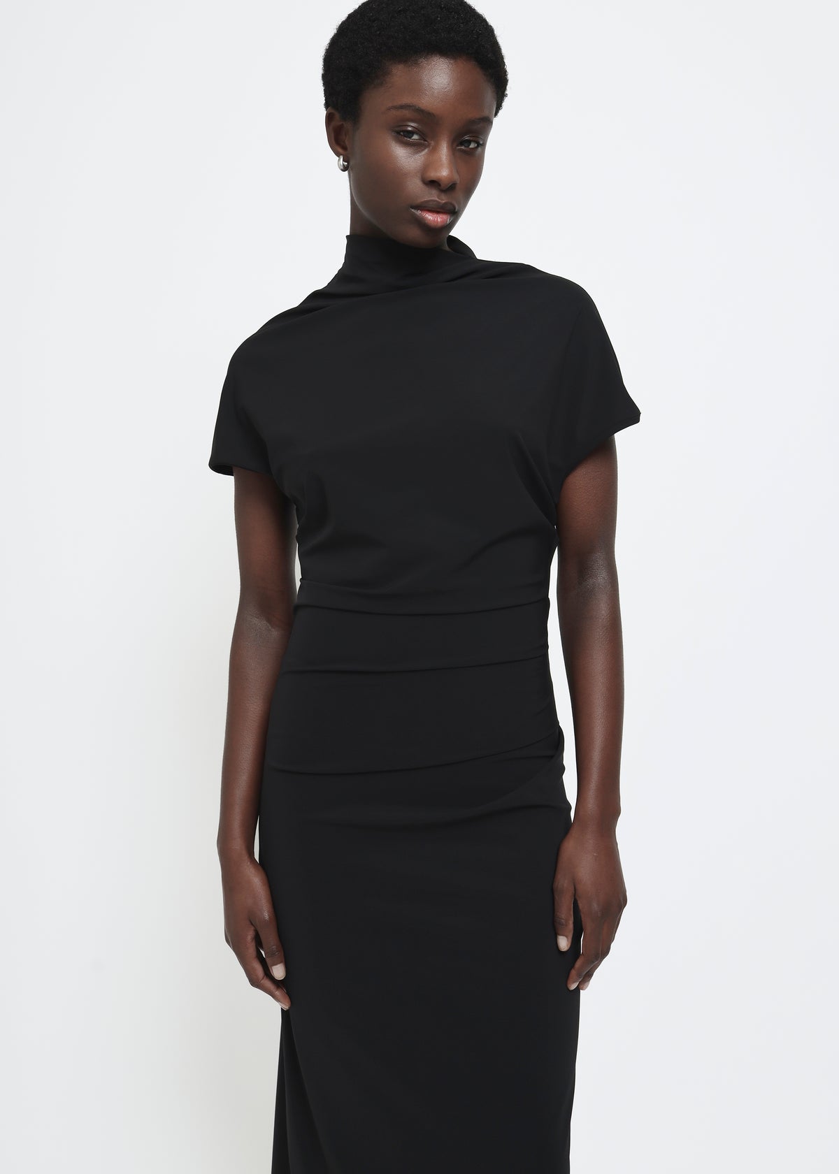 Black cap-sleeve ankle-length dress with a high mock neckline and soft waist folds