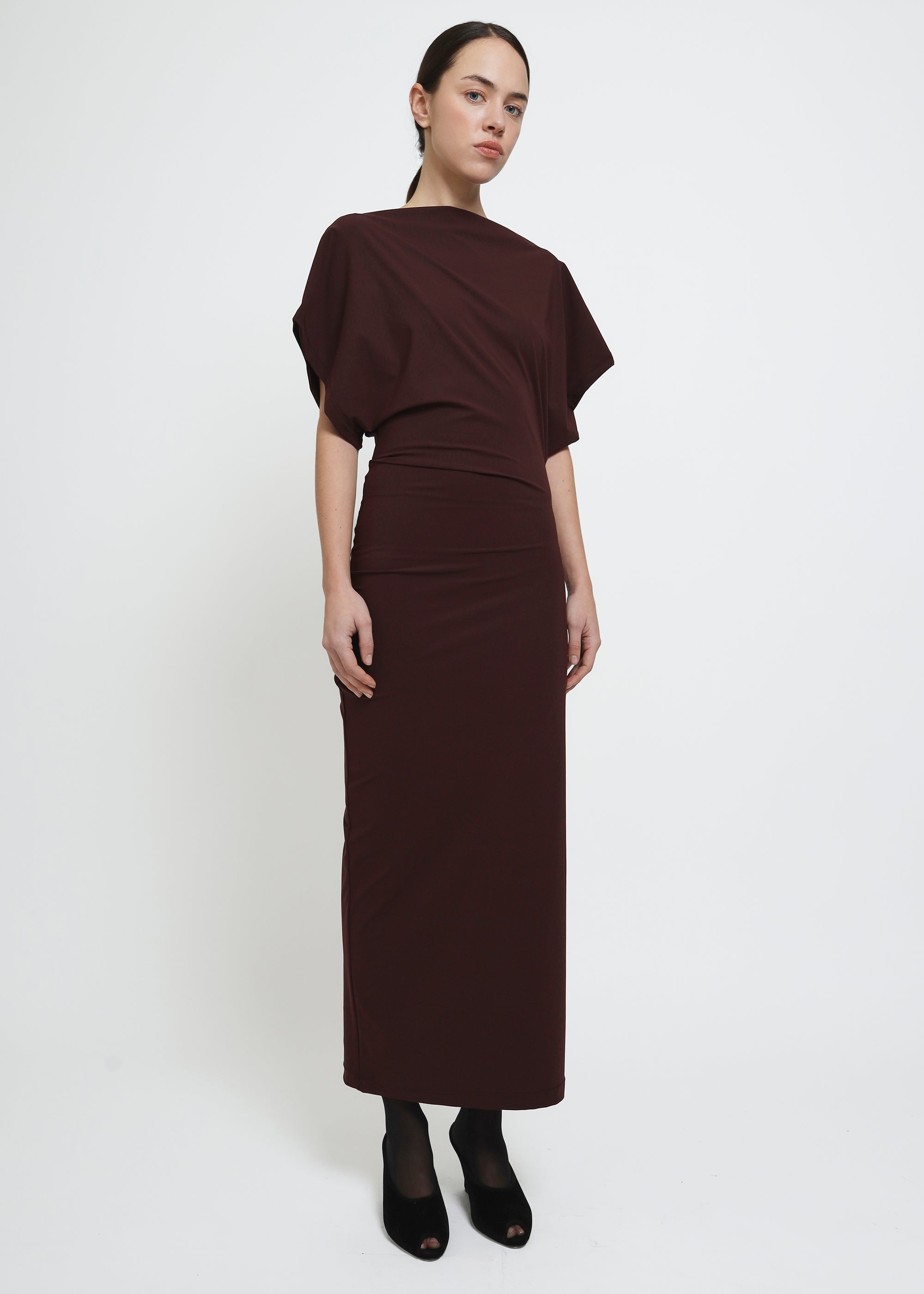 A dark red midi dress with draped short sleeves and a gathered waist.
