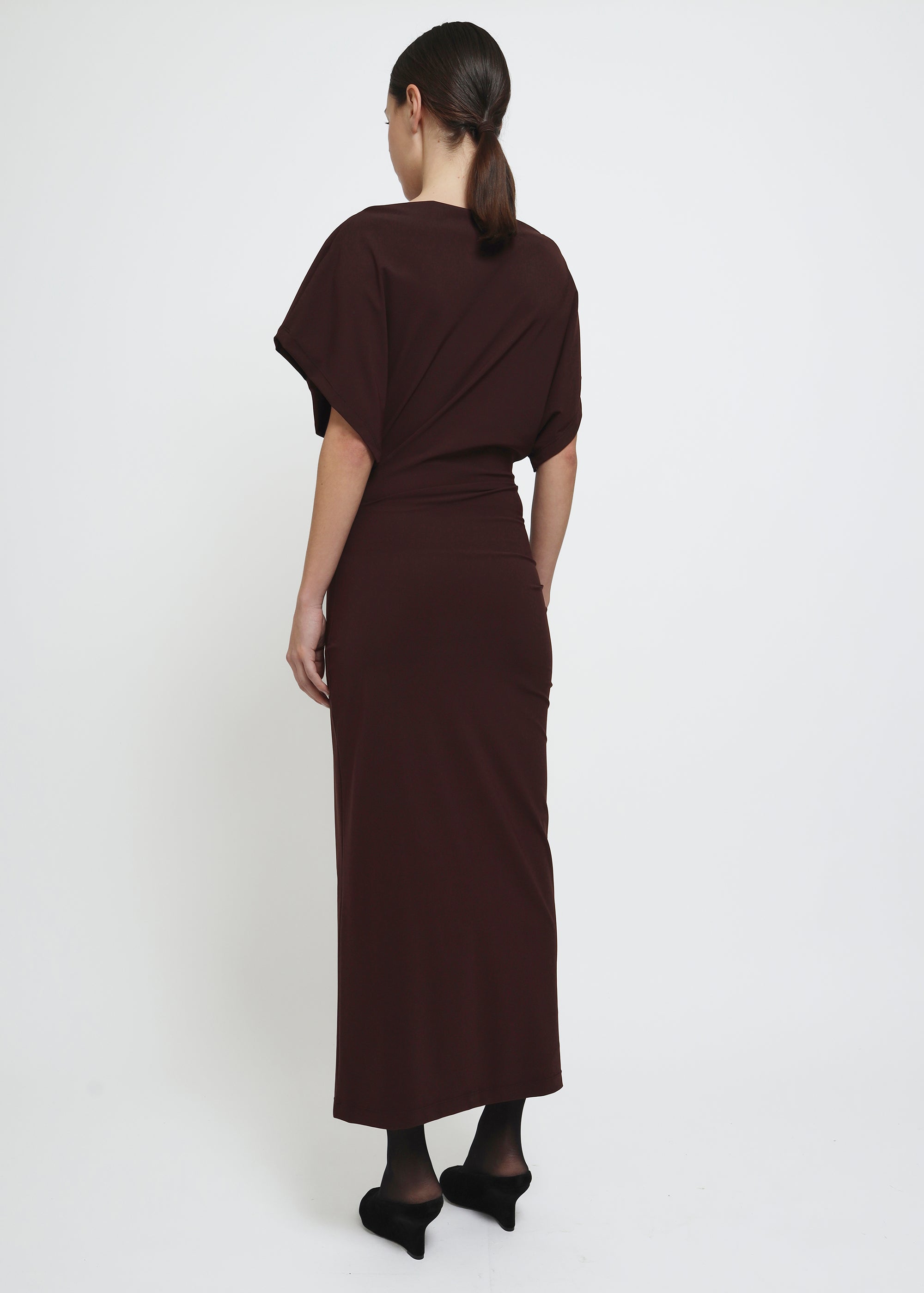 A dark red midi dress with draped short sleeves and a gathered waist.