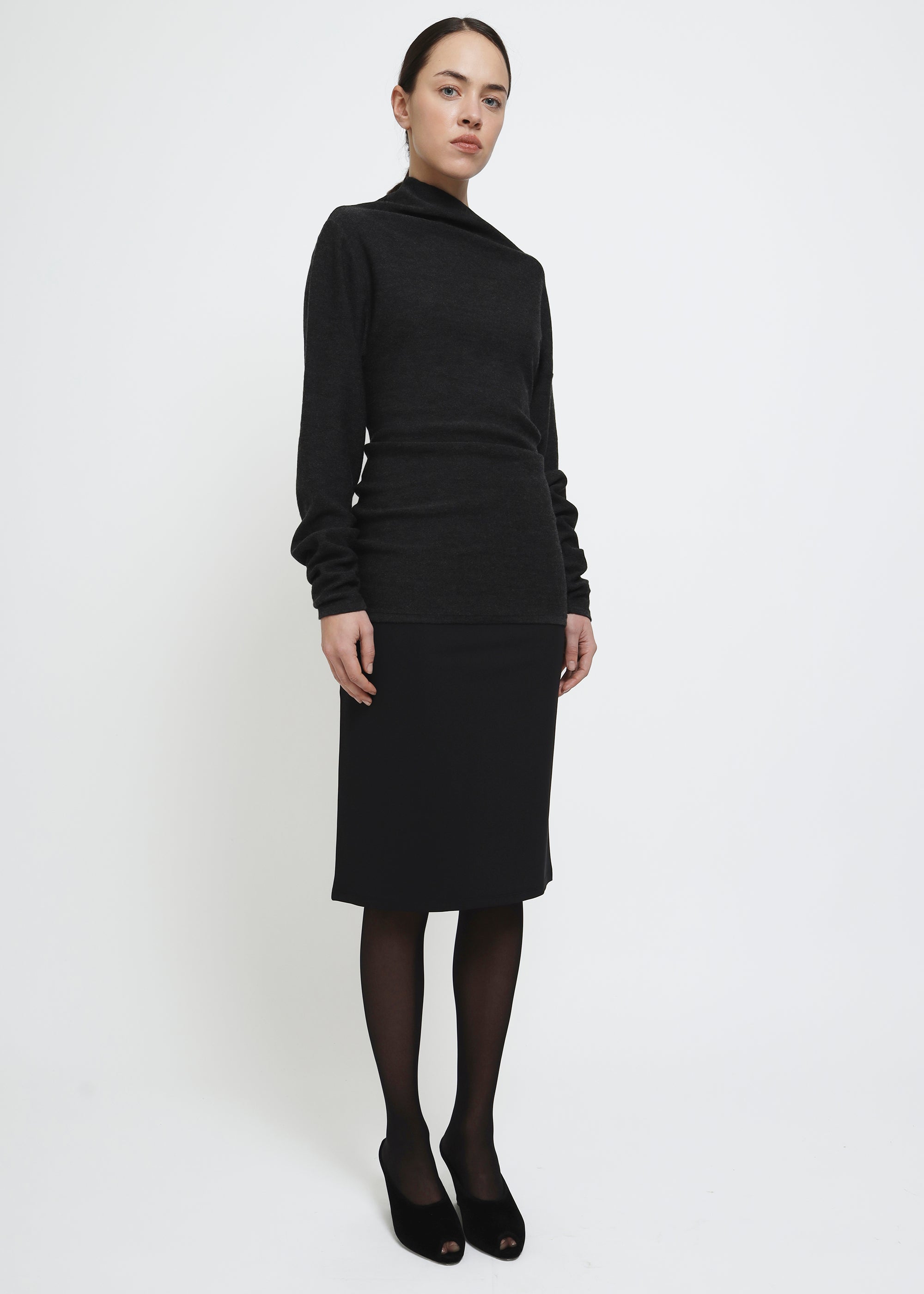 Black straight-fit midi skirt with a clean, minimal silhouette