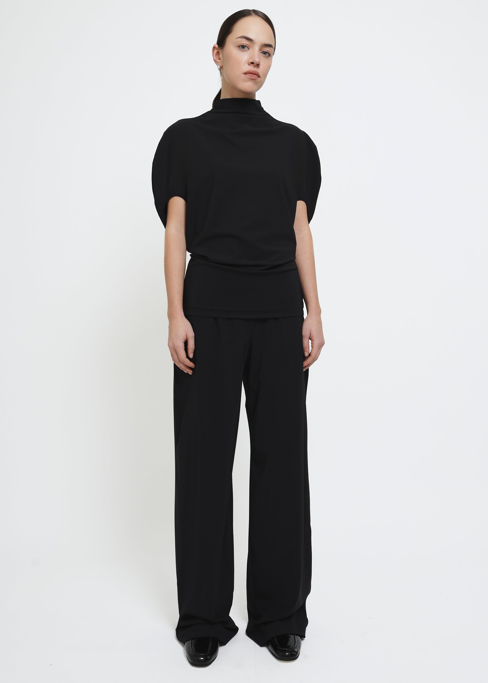 A black wide-leg pull on trousers.