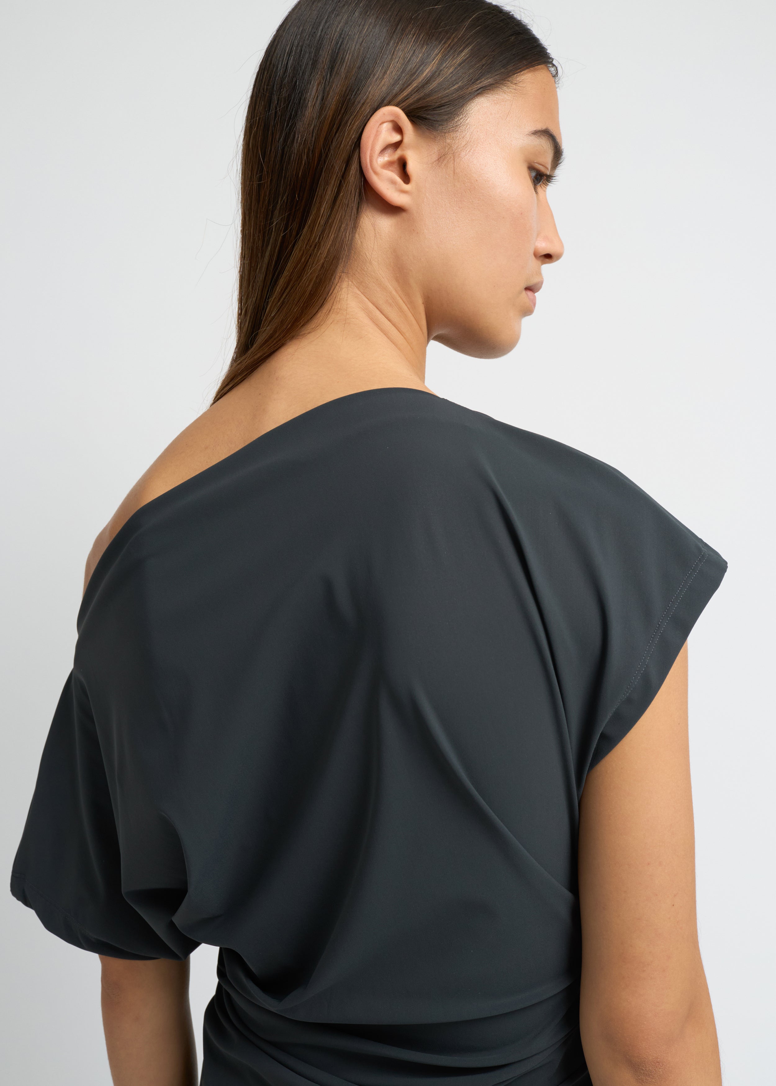 Charcoal off-shoulder draped top with soft waist gathering