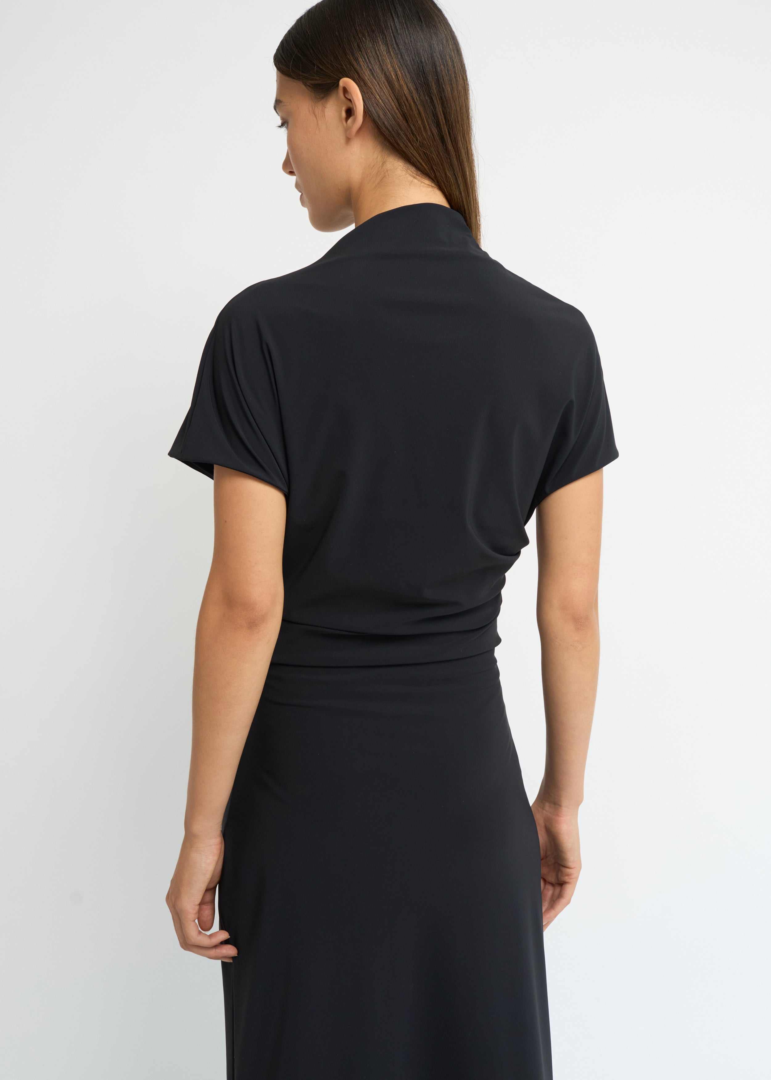 Black cap-sleeve ankle-length dress with a high mock neckline and soft waist folds